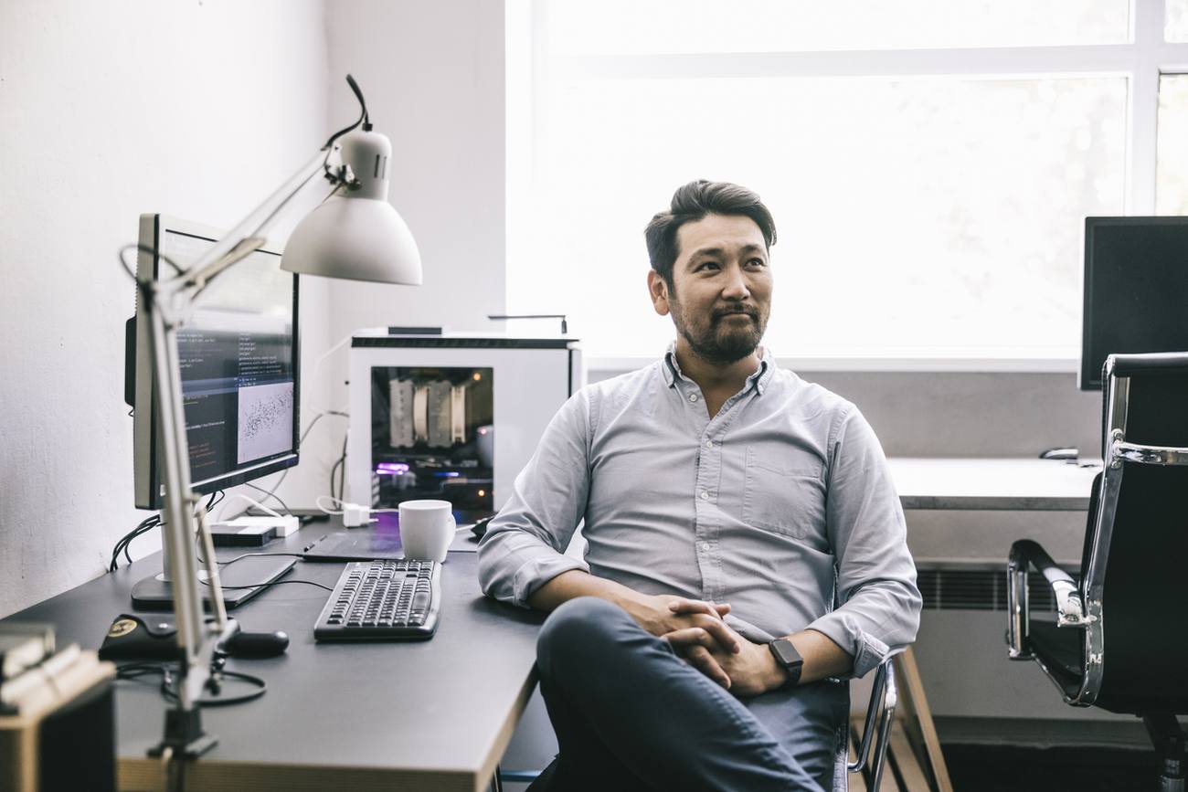An operator at the desk of the business he runs